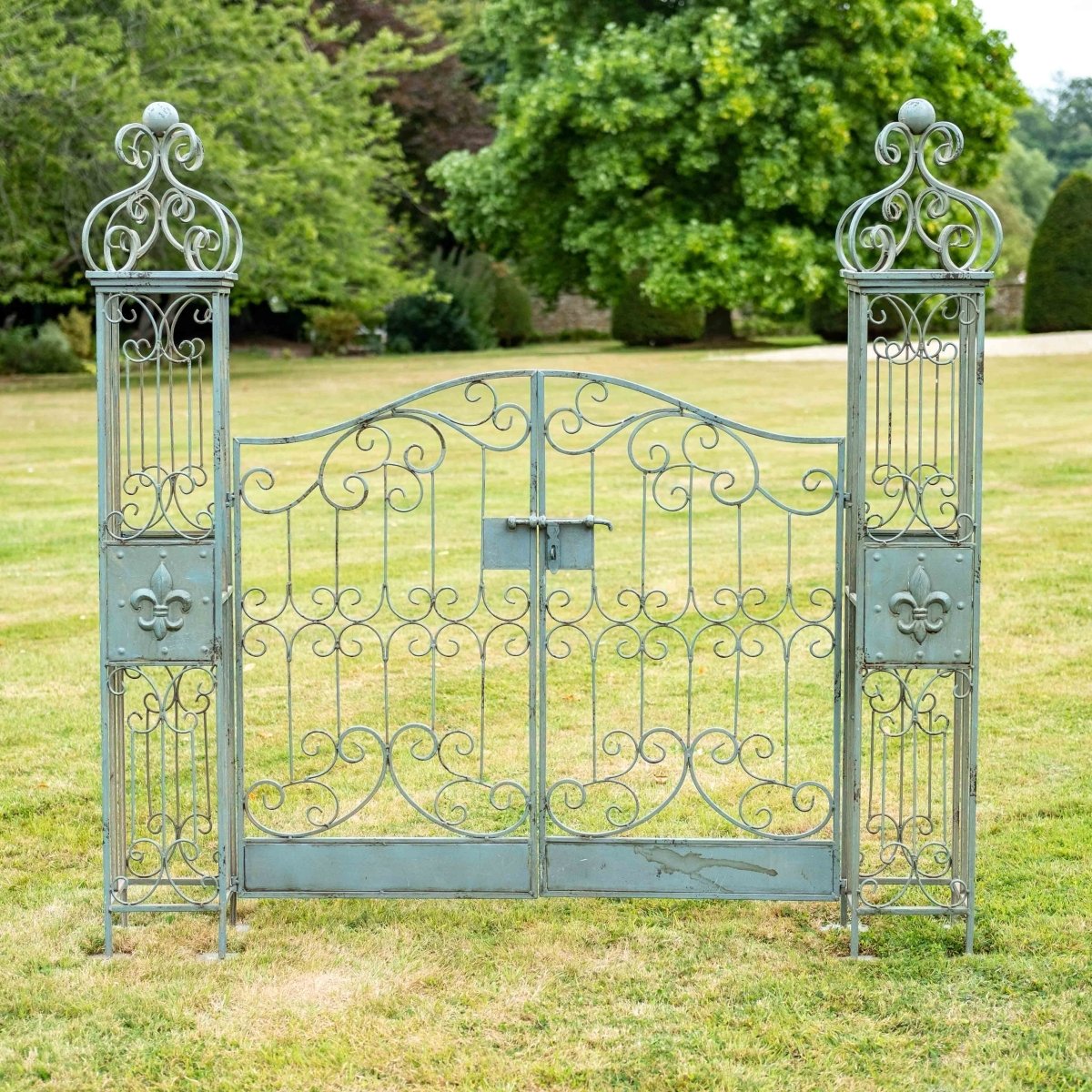 Vintage wrought iron garden gates antiqued blue Opulent Co